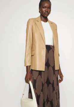 Marimekko Kyllikki Kivet Plissee Skirt - Plooirok - Dark Brown/Brown -Marimekko Winkel 37c5b724a8e54a829f0c4aea554fa7a1 scaled