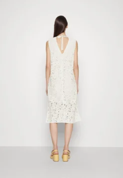 Marimekko Ranso Unikko Dress - Gebreide Jurk - Light Yellow/Off-White 8 Marimekko Ranso Unikko Dress - Gebreide Jurk - Light Yellow/Off-White -Marimekko Winkel 5c211805cb424720911cd7761f8a3314 scaled