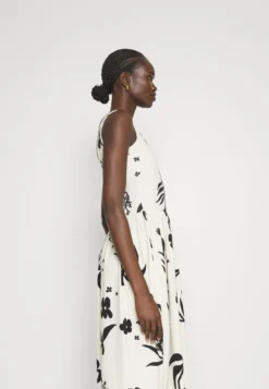 Marimekko Dreija Herbaario Dress - Jerseyjurk - Offwhite/Black -Marimekko Winkel 62f3758b0e574683bbd24e2baa176c52 scaled