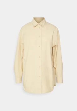 Marimekko Griste Solid Shirt - Blouse - Beige -Marimekko Winkel 884d0317c6584416bba15e0b58ec88b1 scaled