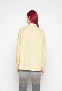 Marimekko Griste Solid Shirt - Blouse - Beige -Marimekko Winkel b7bb7566c9c54552b0d37ba238b68161 scaled