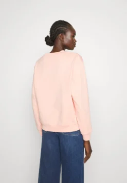 Marimekko Kioski Leiot Unikko Placement - Sweater - Peach -Marimekko Winkel e8cfe993017b4490bb0b9243ae8de8b7 scaled